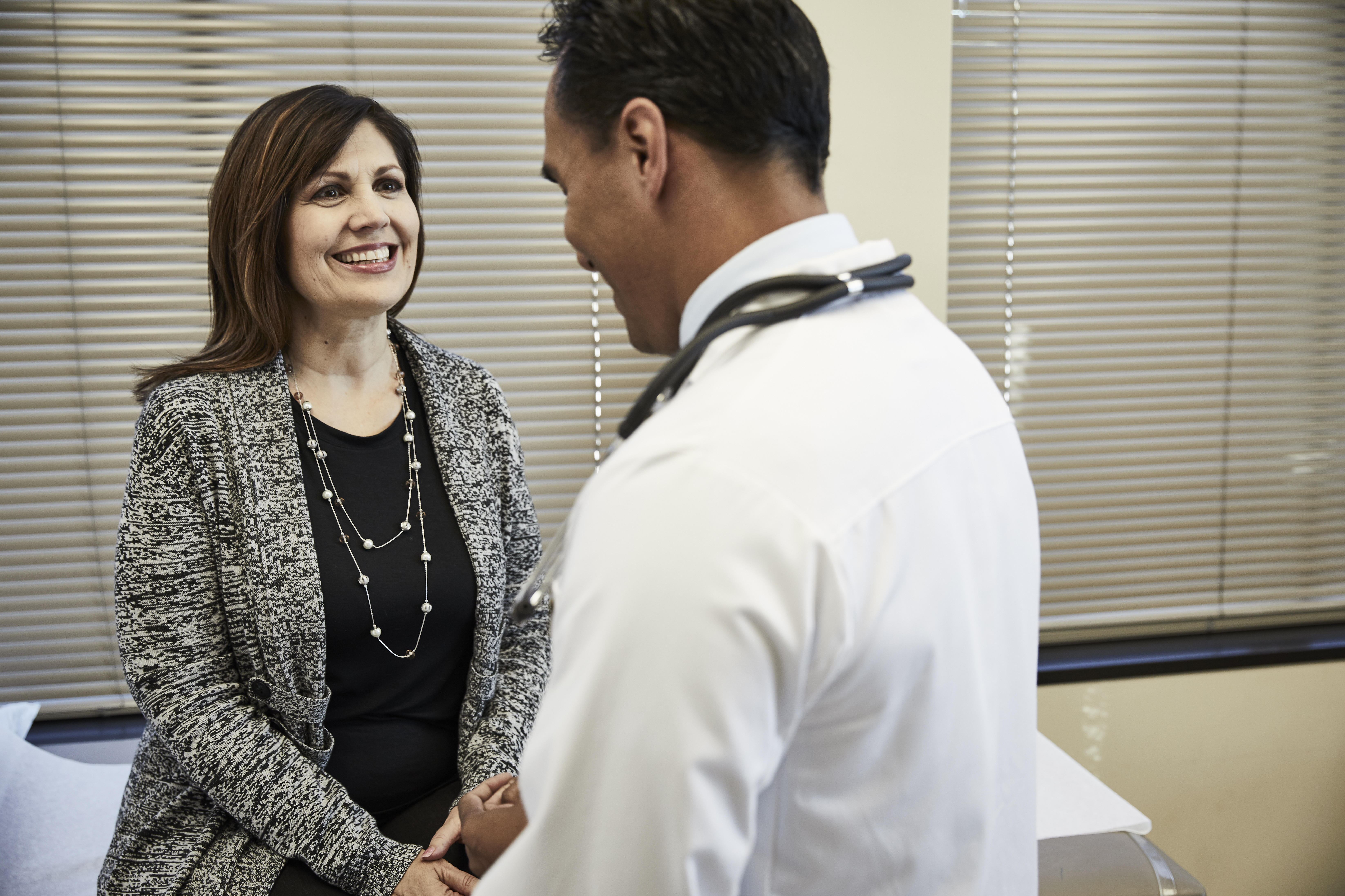 Female Patient with Doctor, smiling